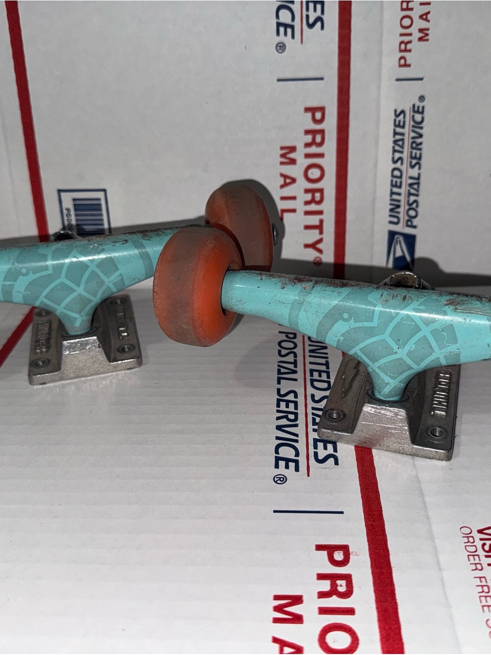 Blue Pattern Skateboard Trucks with pink Orange Wheels - thunder brand grenade